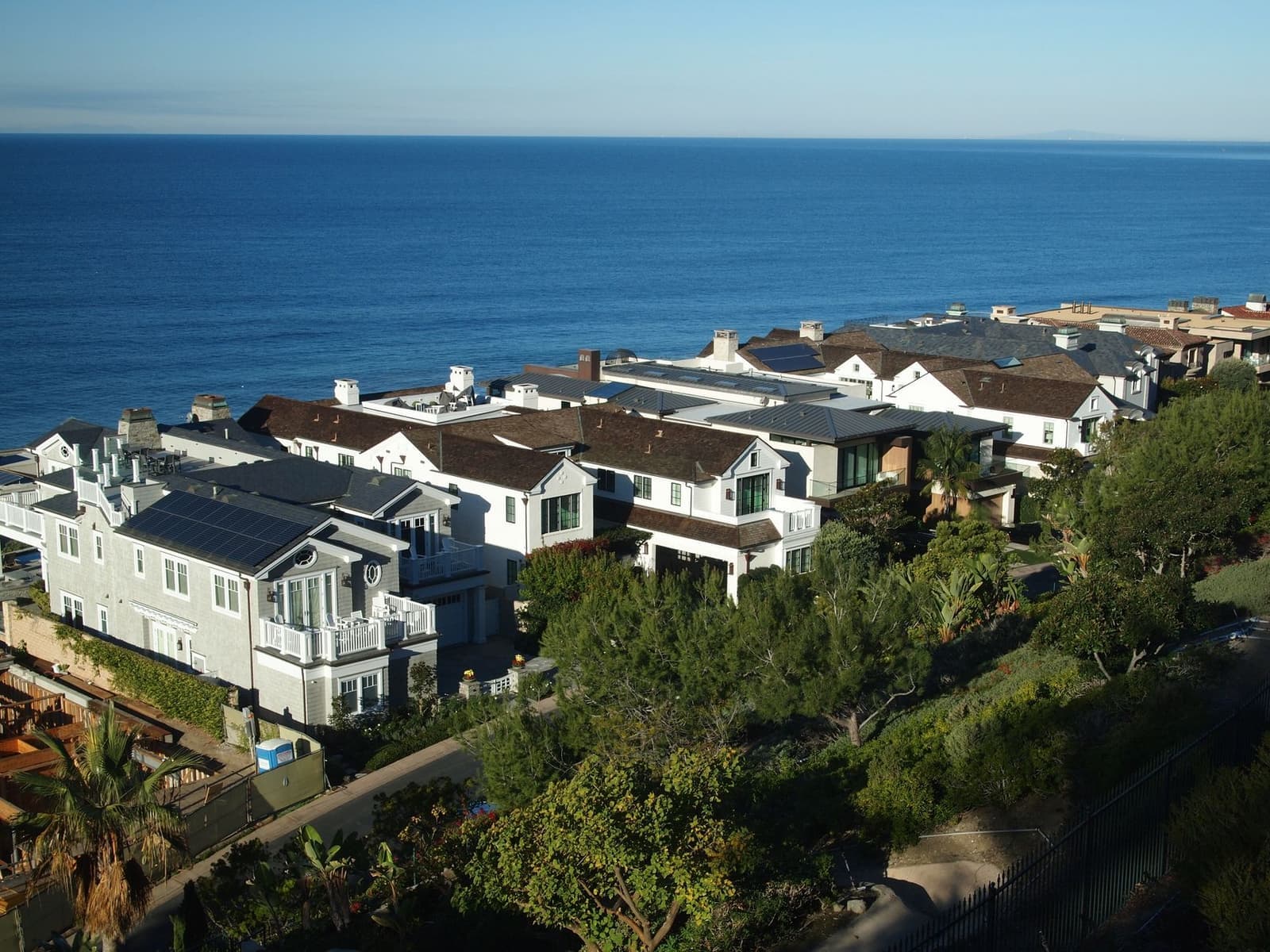 Houses with sunny roofs seen from above
