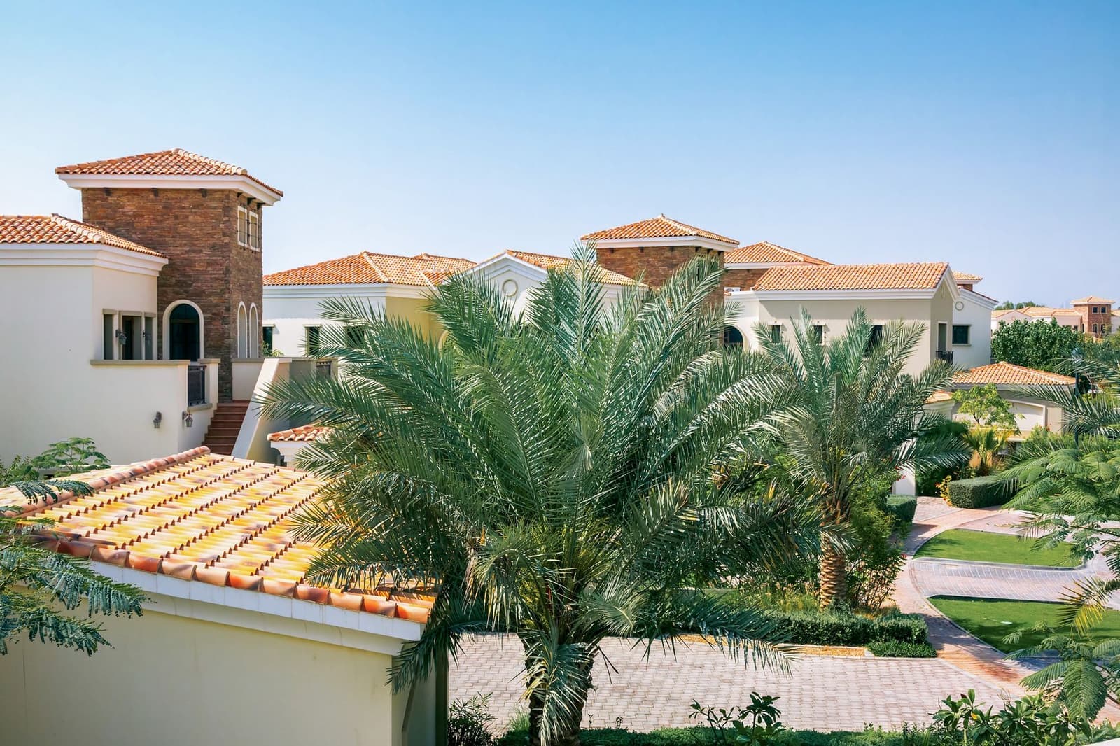 House with tile roofs and trees